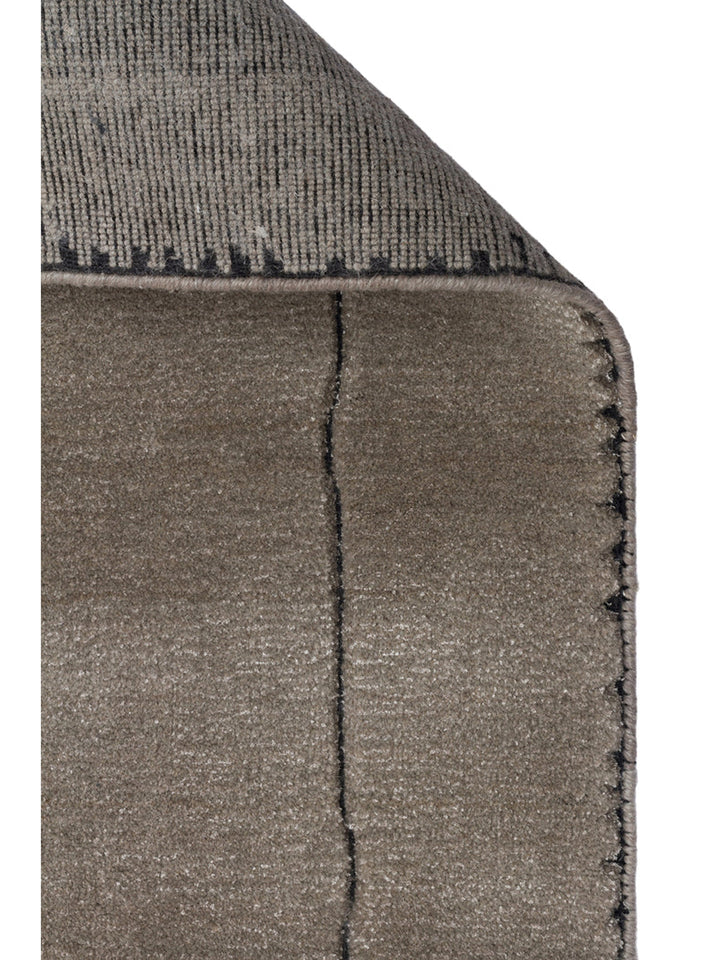 Tapis fait main en mélange de laine, rayonne et polyester de la série Dakar GRIS